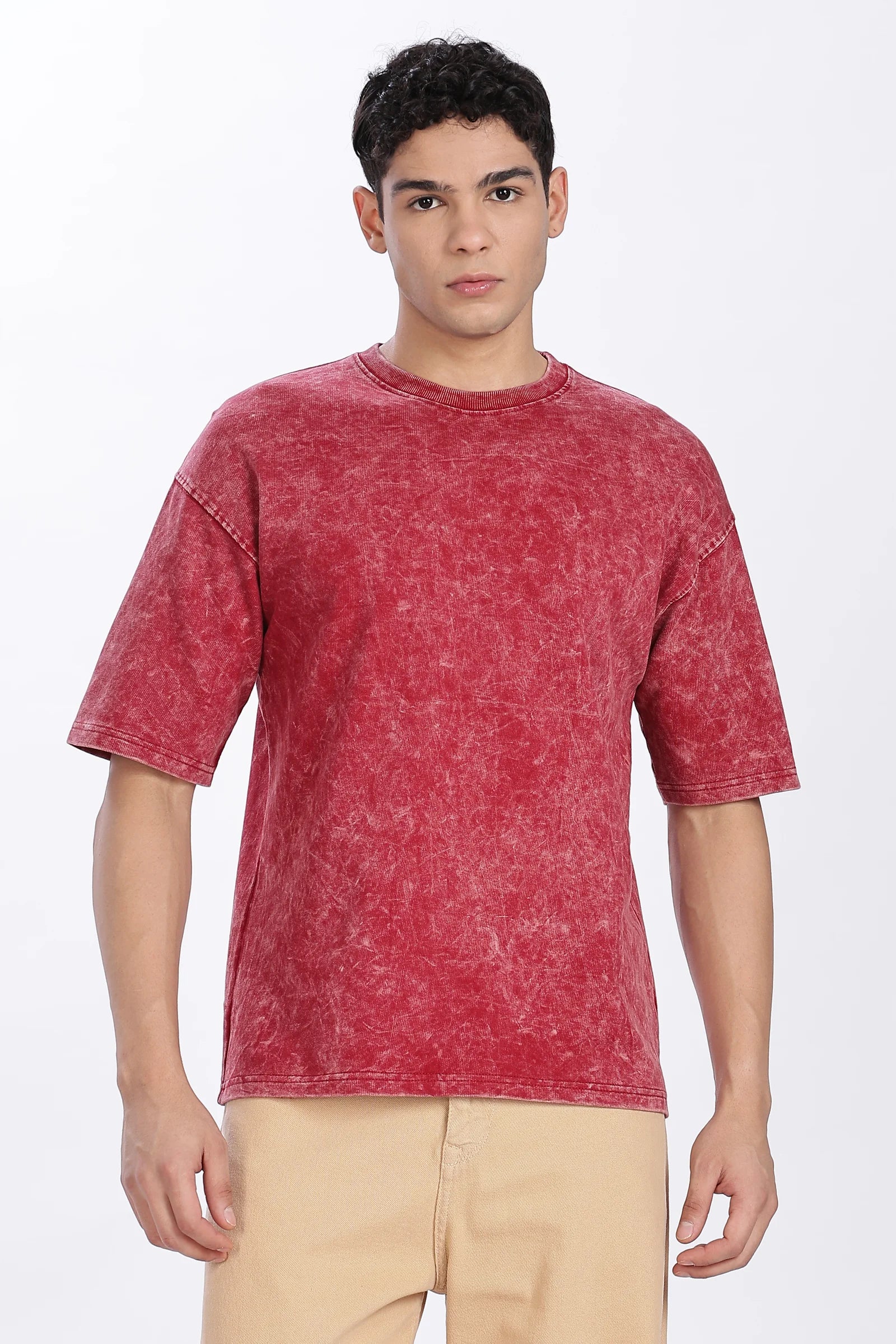 Man wearing a red t-shirt on a white background
