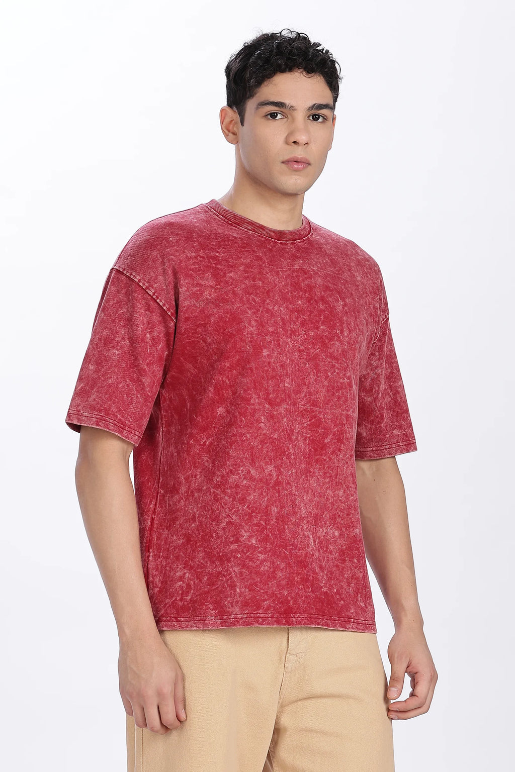 Man wearing a red t-shirt on a white background