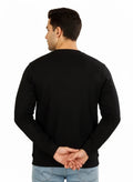 Man wearing a black sweater on a white background