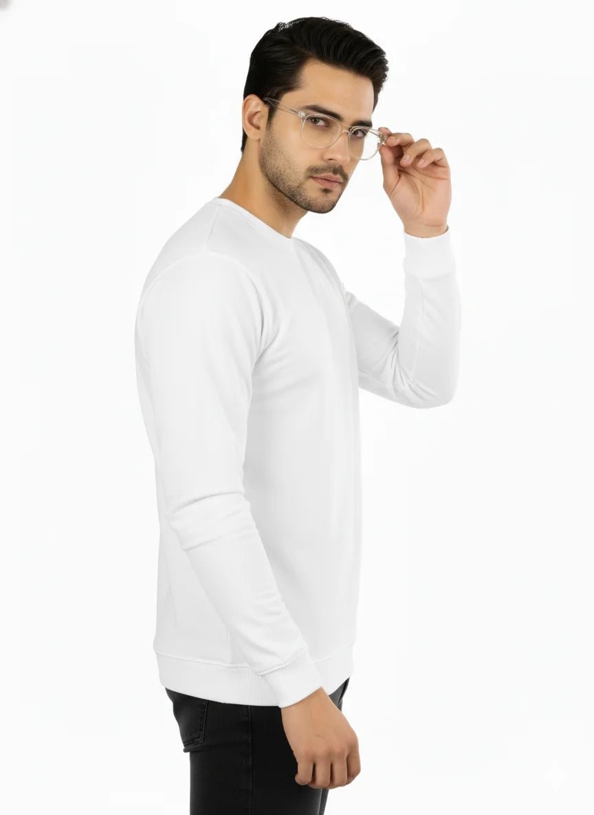 Man wearing a white long-sleeve shirt on a white background