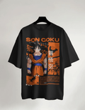 Black t-shirt with Son Goku graphic on a hanger against a gray background