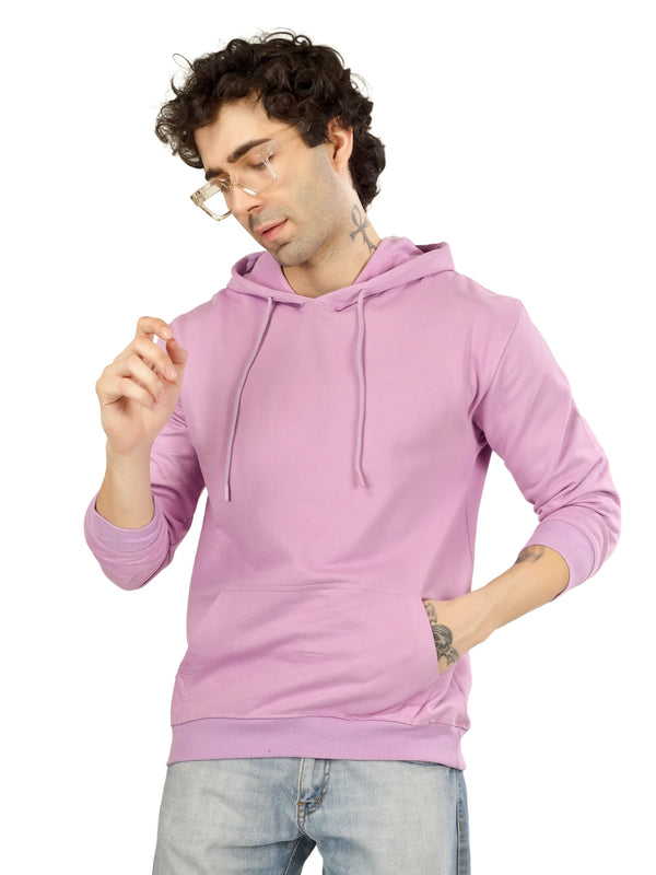 Man wearing a pink hoodie on a white background