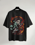 Black t-shirt with anime character and flames design on a hanger against a light gray background